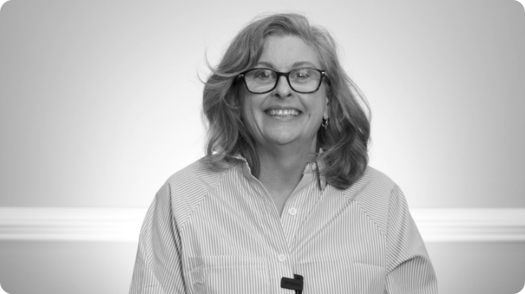 Smiling woman in a striped blouse